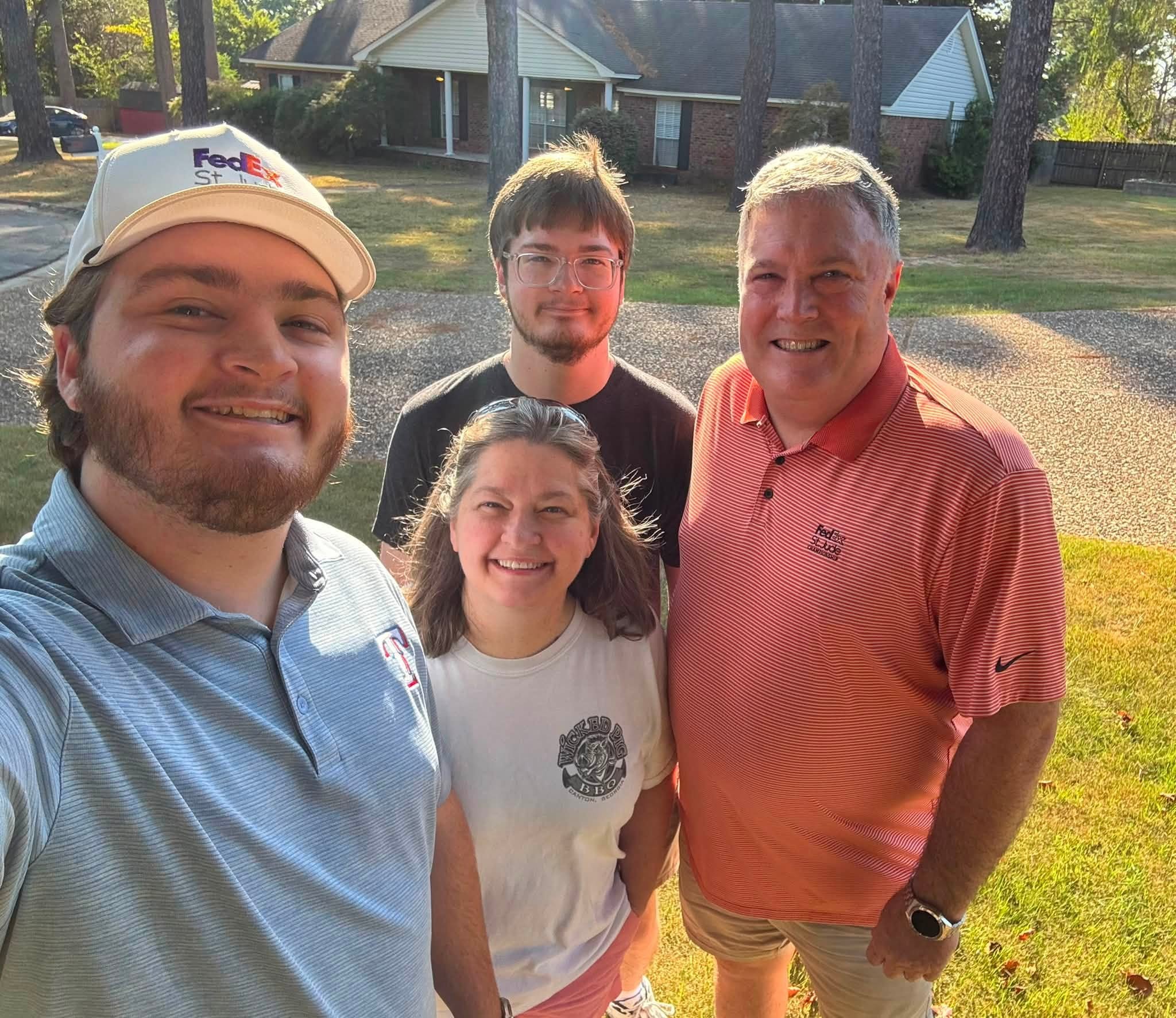 Jeff Elmore with his wife Michelle and their two sons.