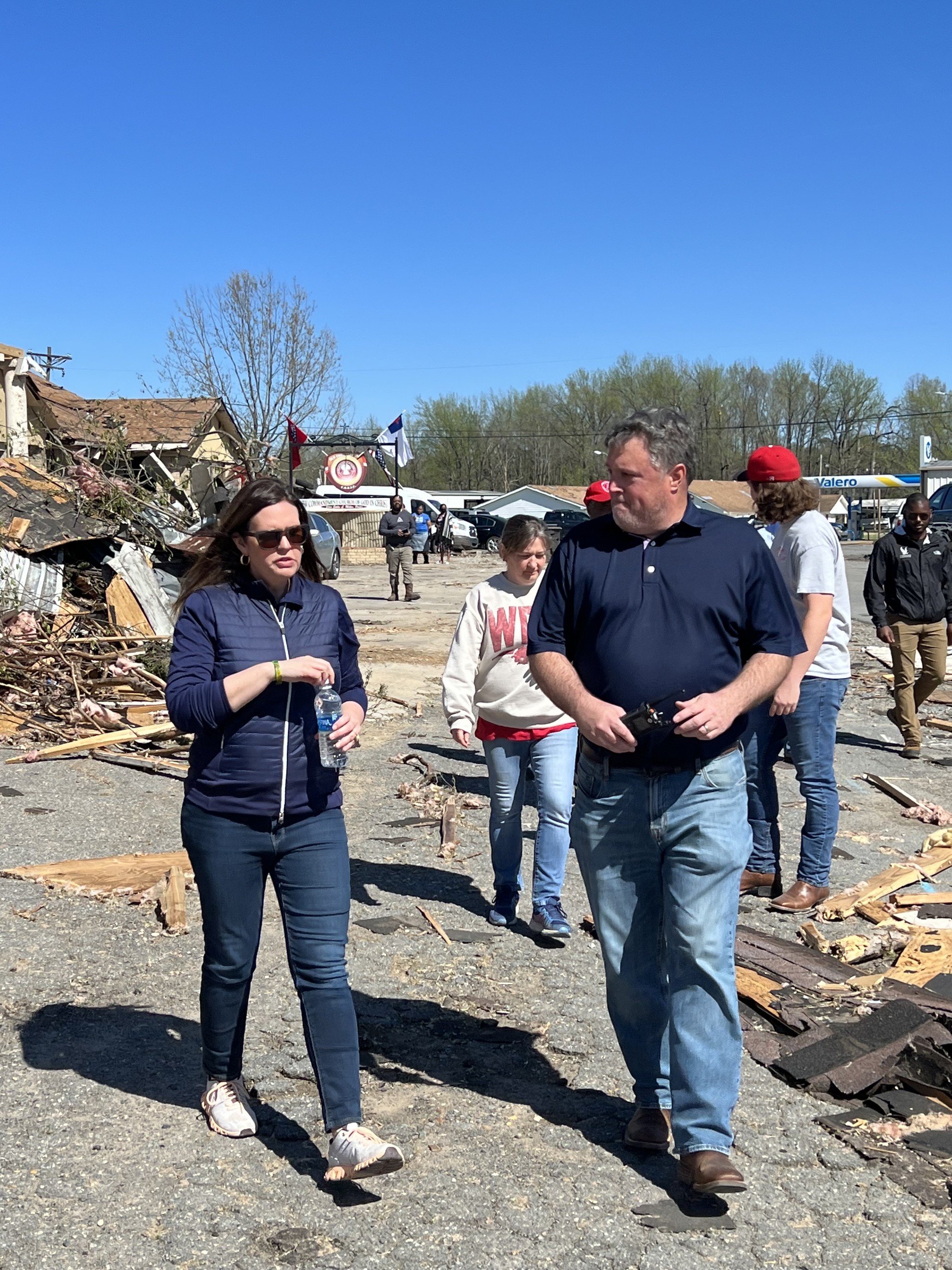 Mayor Elmore on the ground amid tornado debris in Jacksonville, 2023.